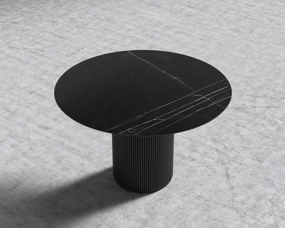 Round black marble pedestal dining table