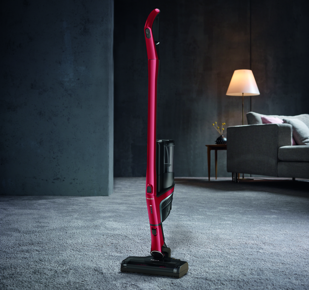 Miele's modern vacuum in ruby red colour