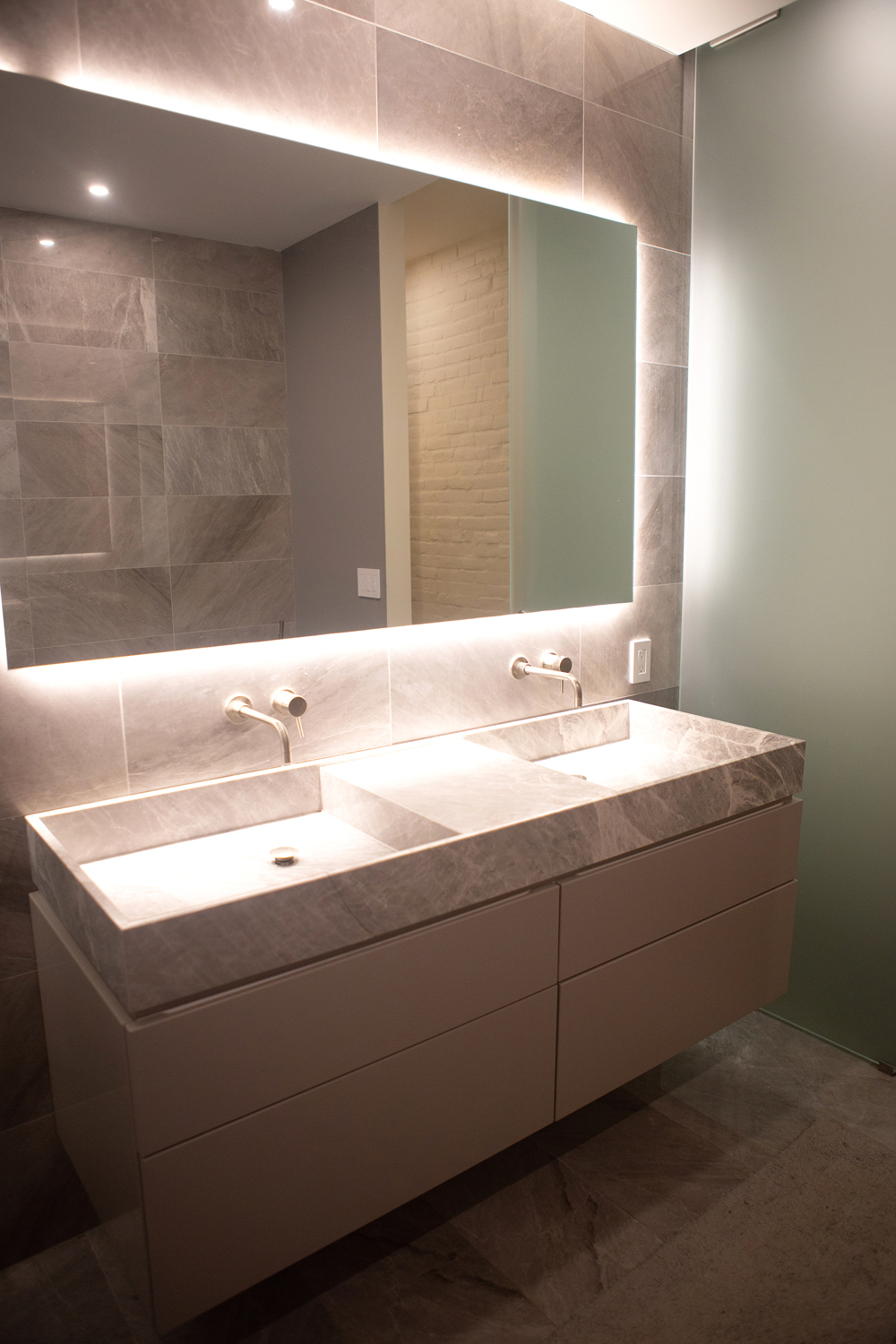 grey bathroom, backlit mirror, double rectangular sink floating vanity