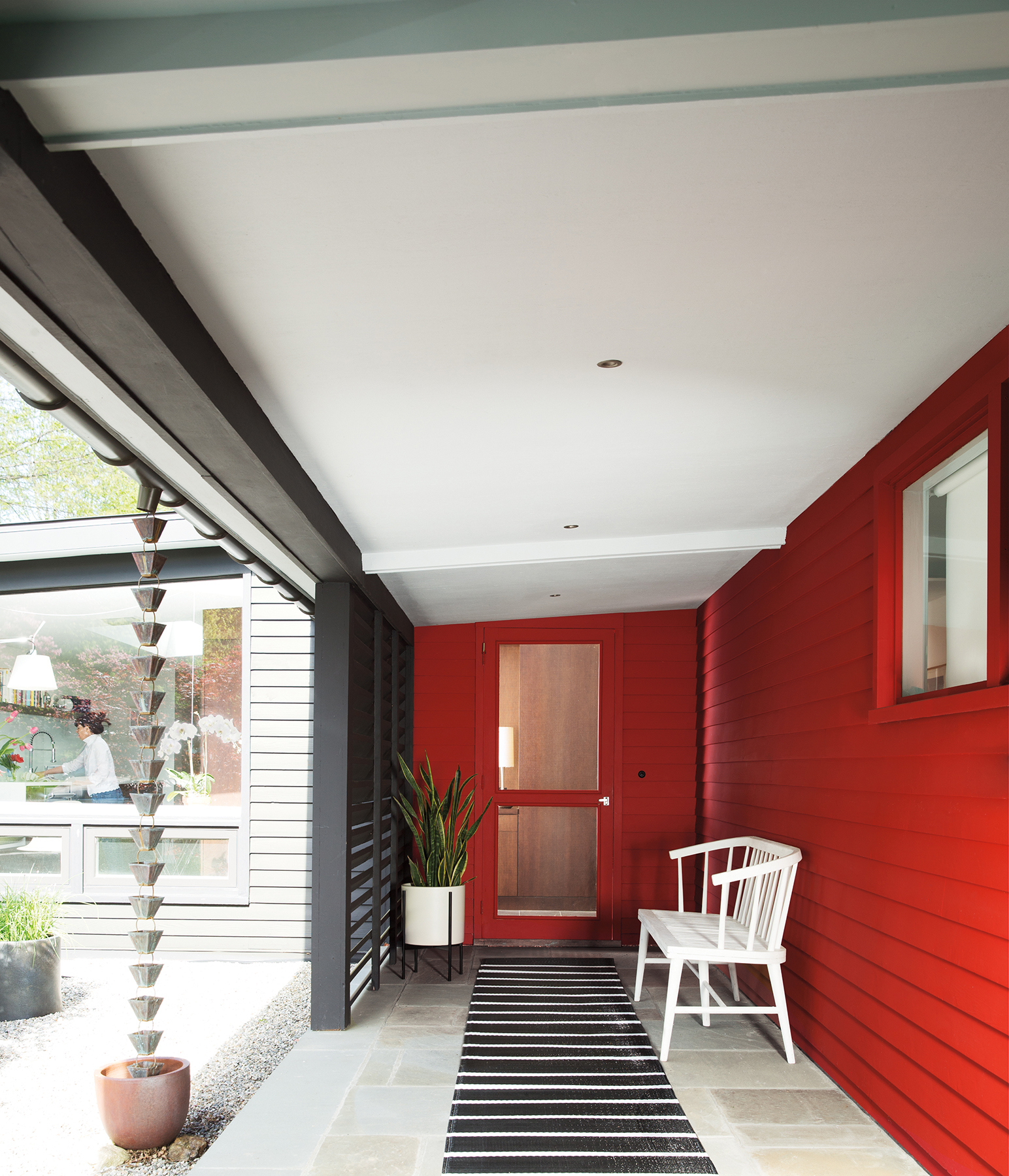 Red exterior siding of home