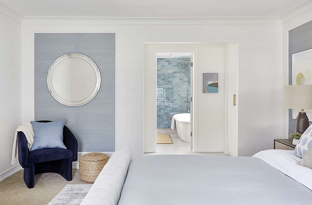 A bedroom and en suite with various blues.