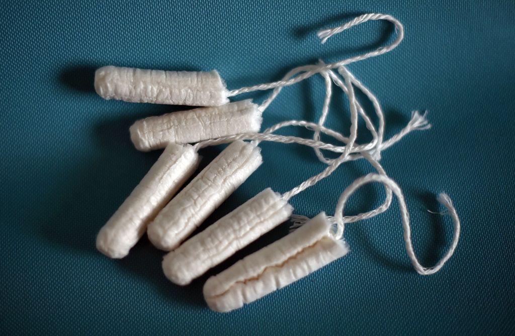 Several unpackaged tampons