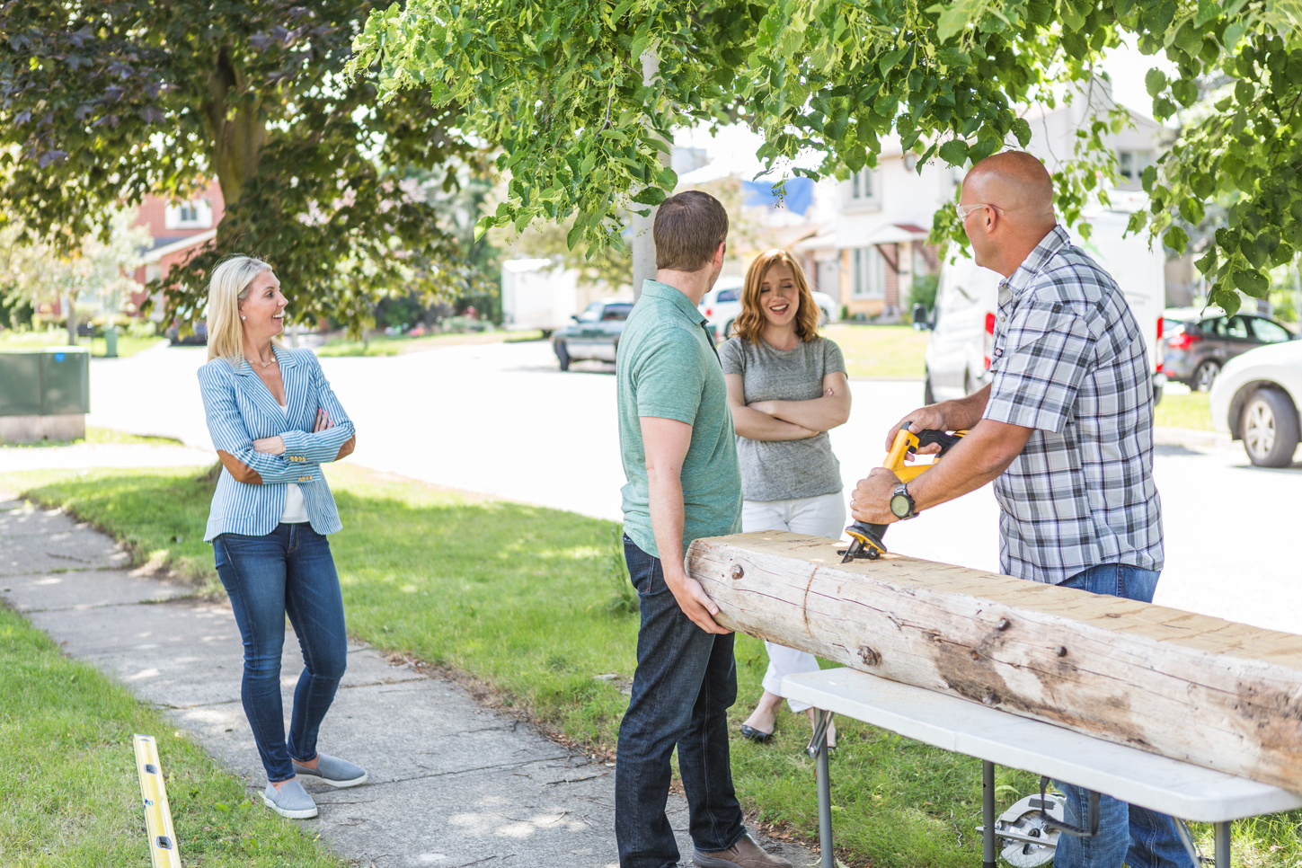 Sarah and Bryan Baeumler working with clients