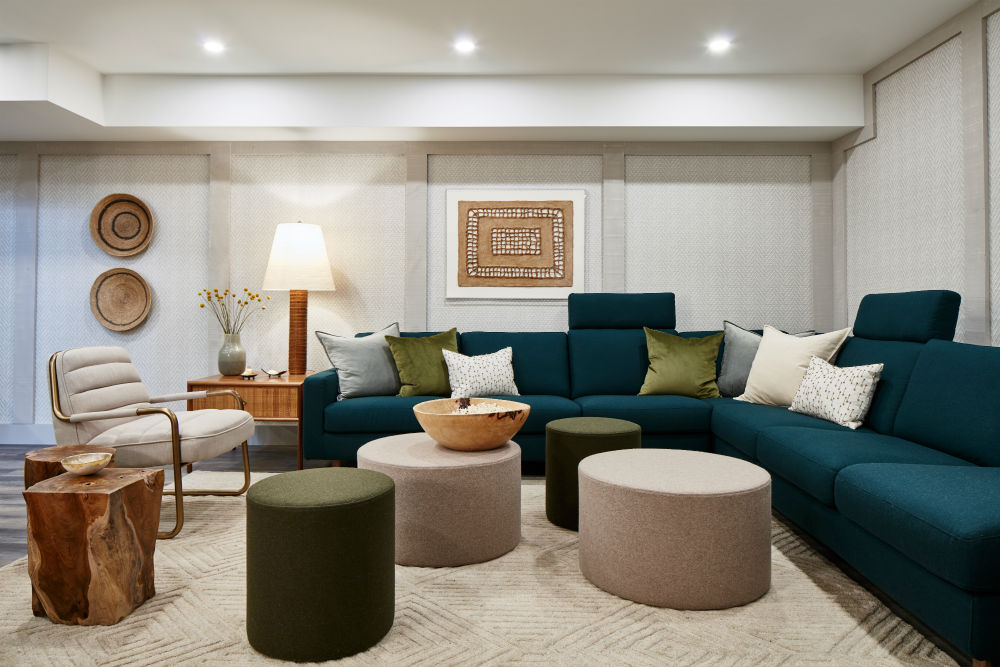 Basement media room with turquoise sectional