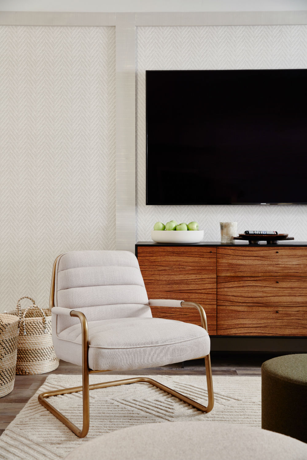 Textured white walls and a mid century modern armchair