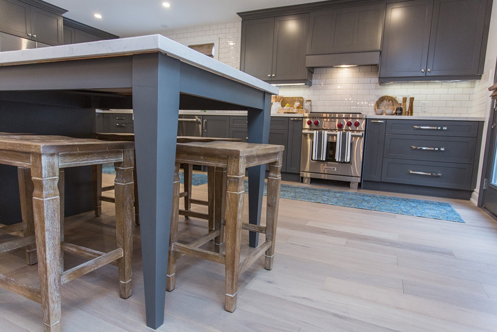 Grey kitchen with rustic kitchen chairs