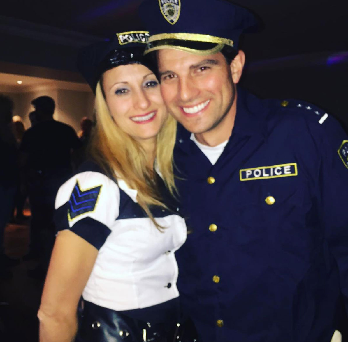 Sabrina and Scott McGillivray dressed up as police officers