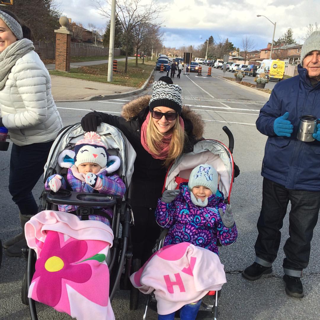 Sabrina McGillivray with daughters at Santa Claus parade