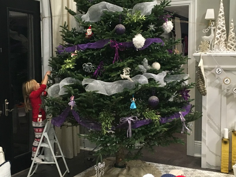 Scott McGillivray's daughter decorating the Christmas tree