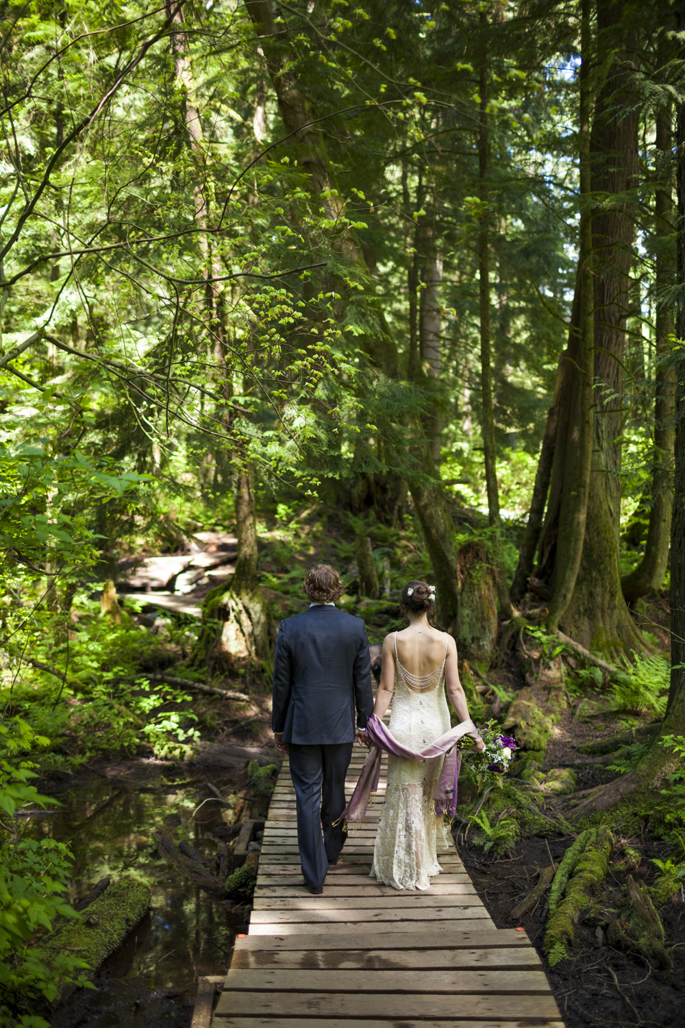 Bride and groom in the woods