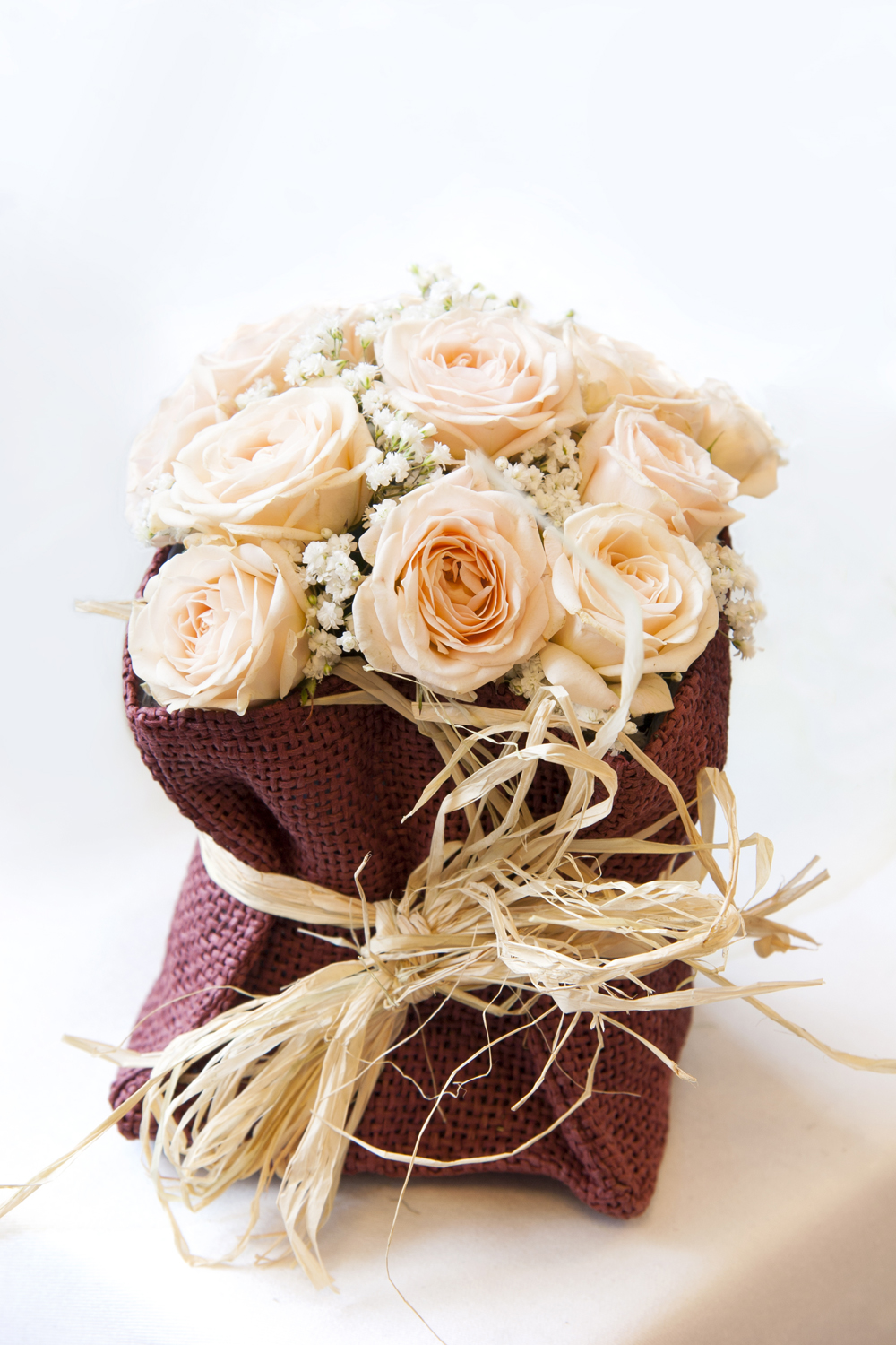 Wedding flowers tied with raffia