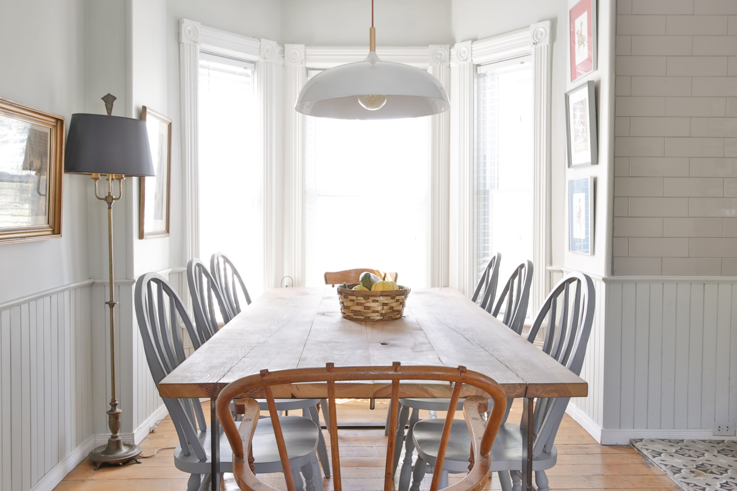 Farmhouse dining table and chairs in white dining room