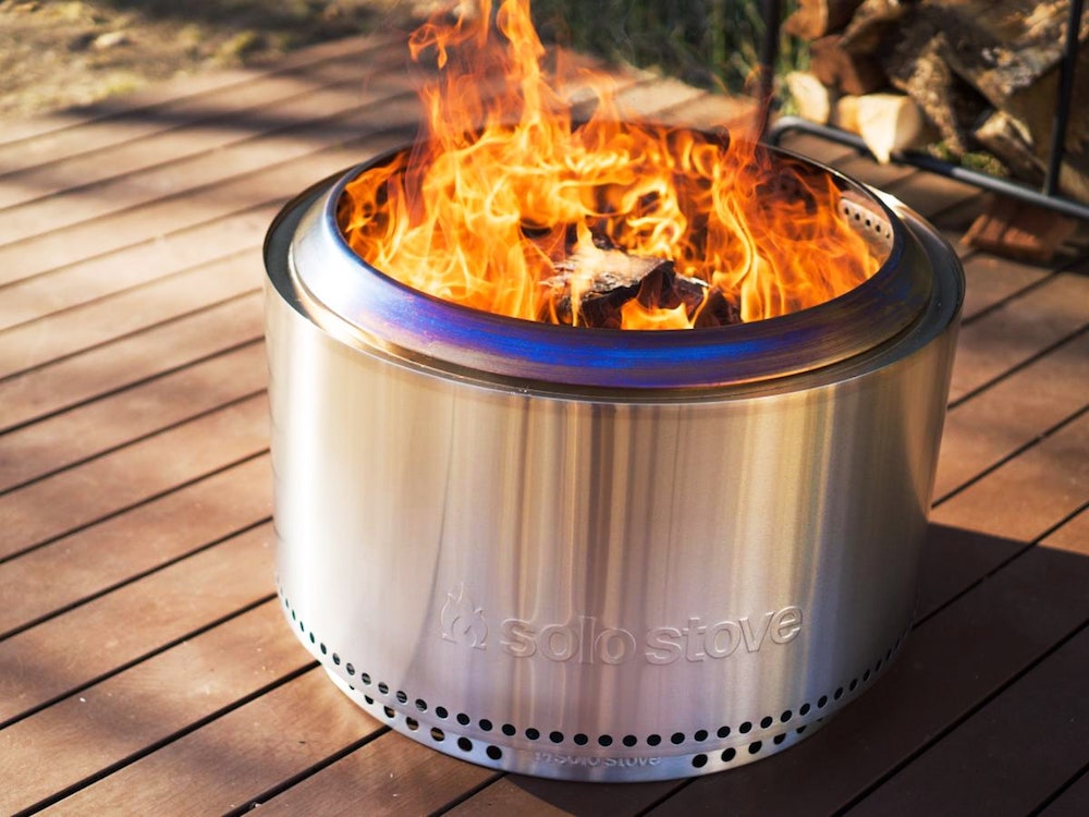 Solo Stove steel smokeless portable fire pit on deck