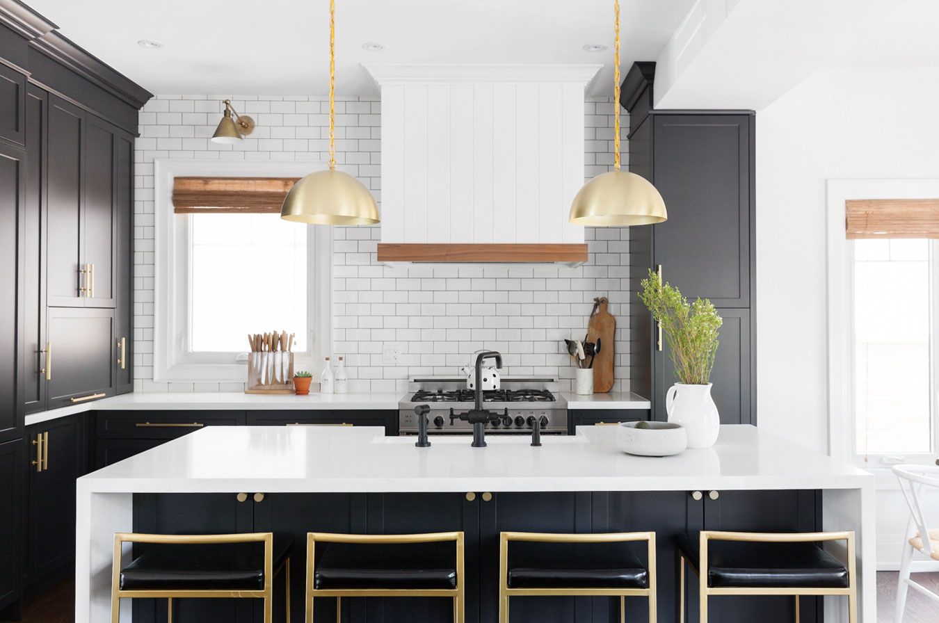 Glamorous gold, black and white kitchen design.