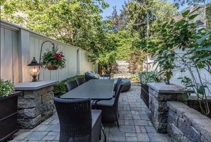 Stone patio of Parisian-inspired home in Toronto's Summerhill neighbourhood