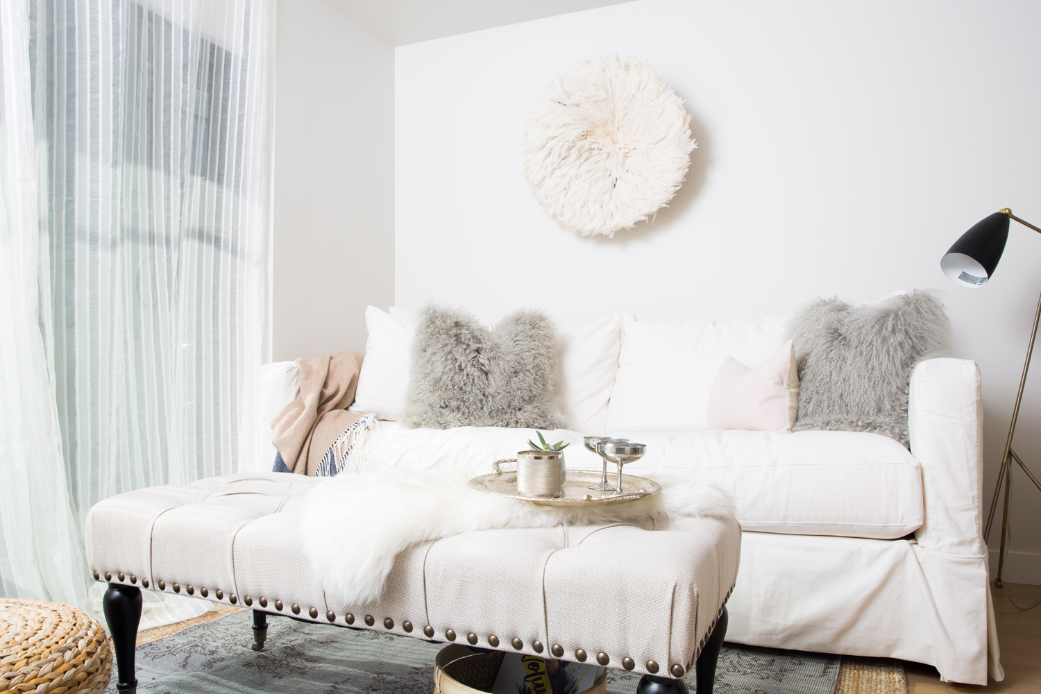 White living room with mohair pillows