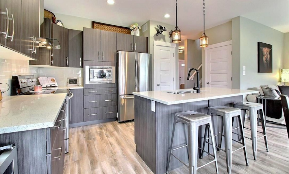 Kitchen of Winnipeg home priced at under $500K