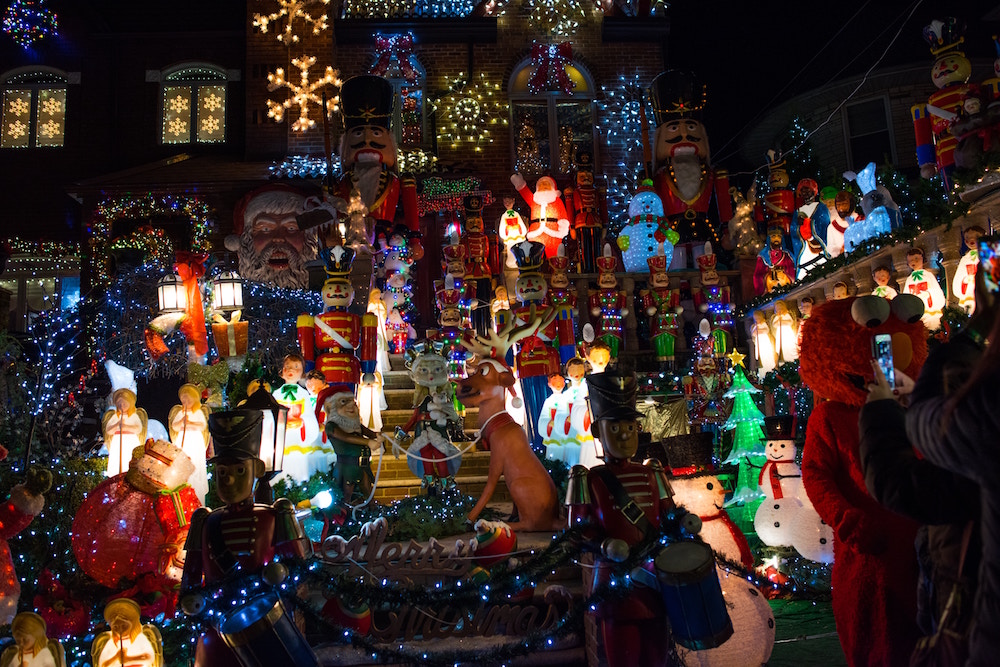 [ALT] house with Christmas lights and large Santa, nutcracker and snowman figures out front