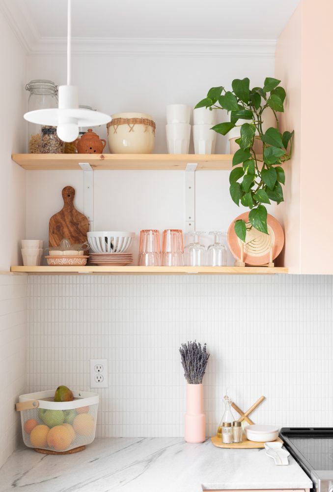 open shelves and tile backsplash in kitchen