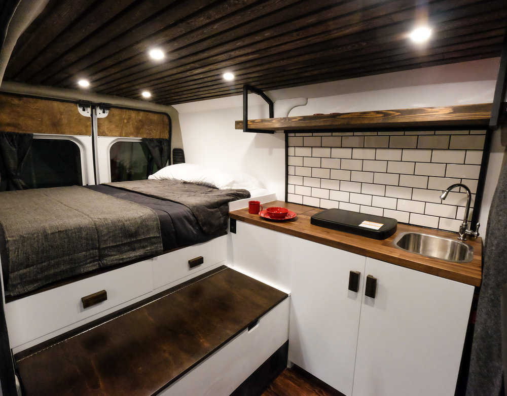 modern camper van interior with subway-tile backsplash