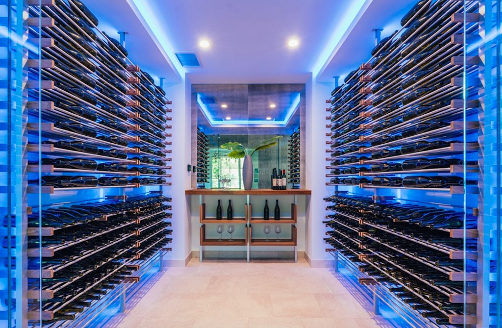 Blue-lit wine cellar