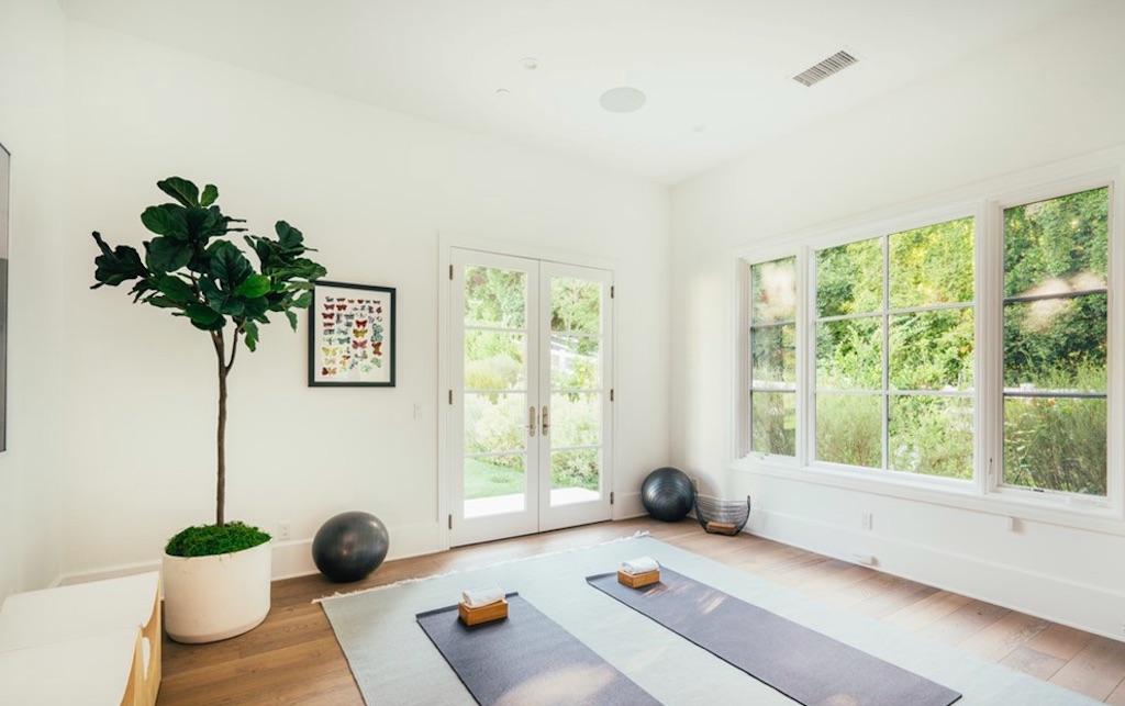 Room with french doors and yoga mats