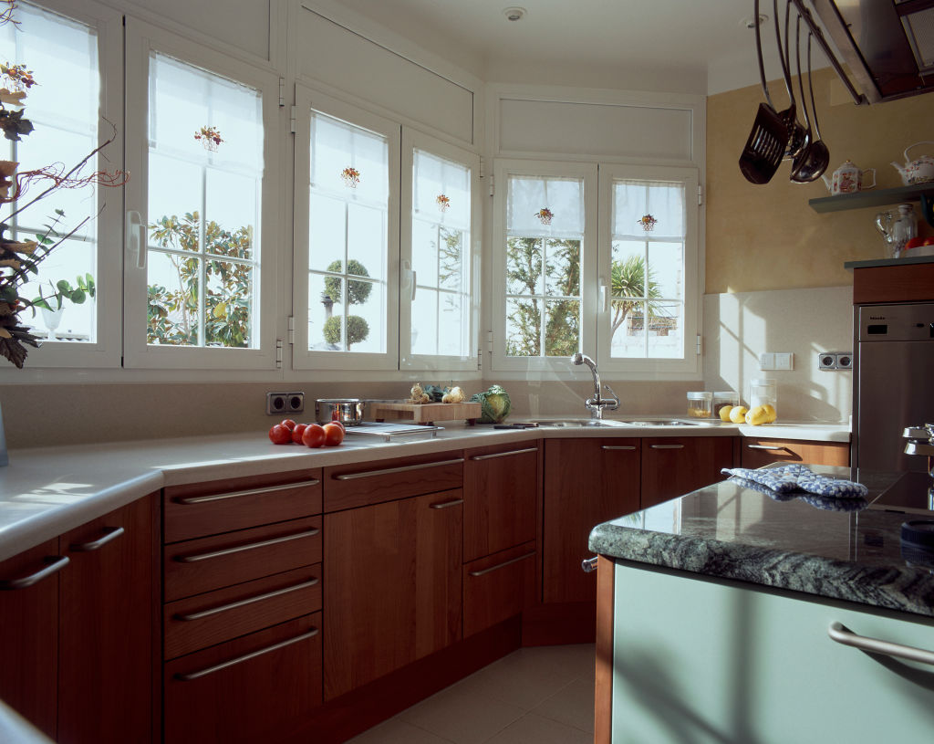 View of wooden cabinets in a kitchen
