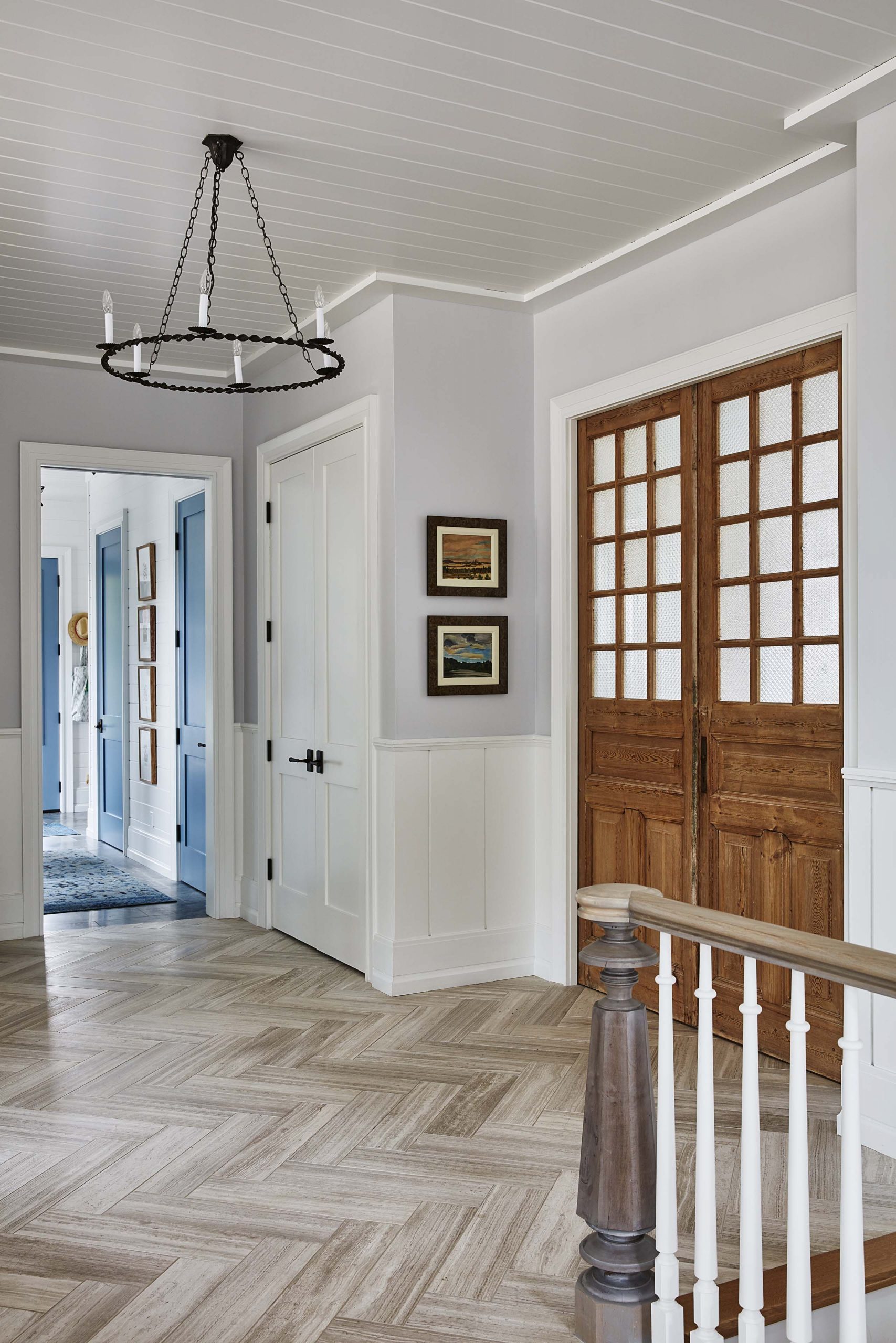 Beautiful frosted french doors in a foyer.