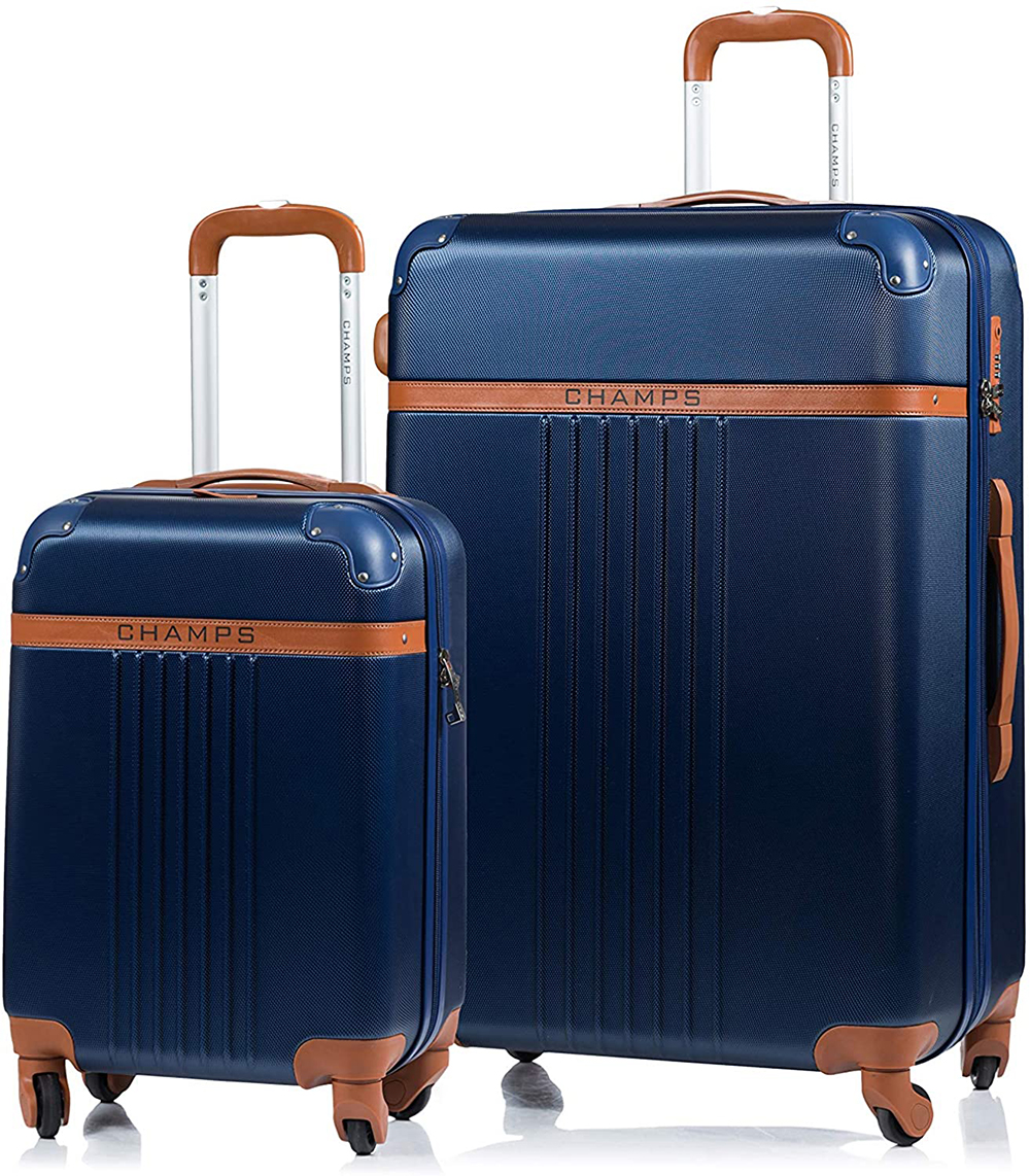 Two hard-shell blue pieces of rolling luggage