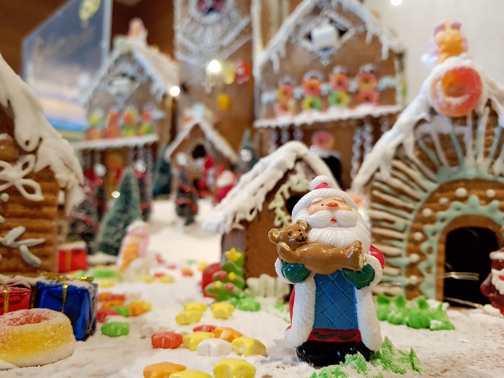 gingerbread houses and christmas decorations with candy