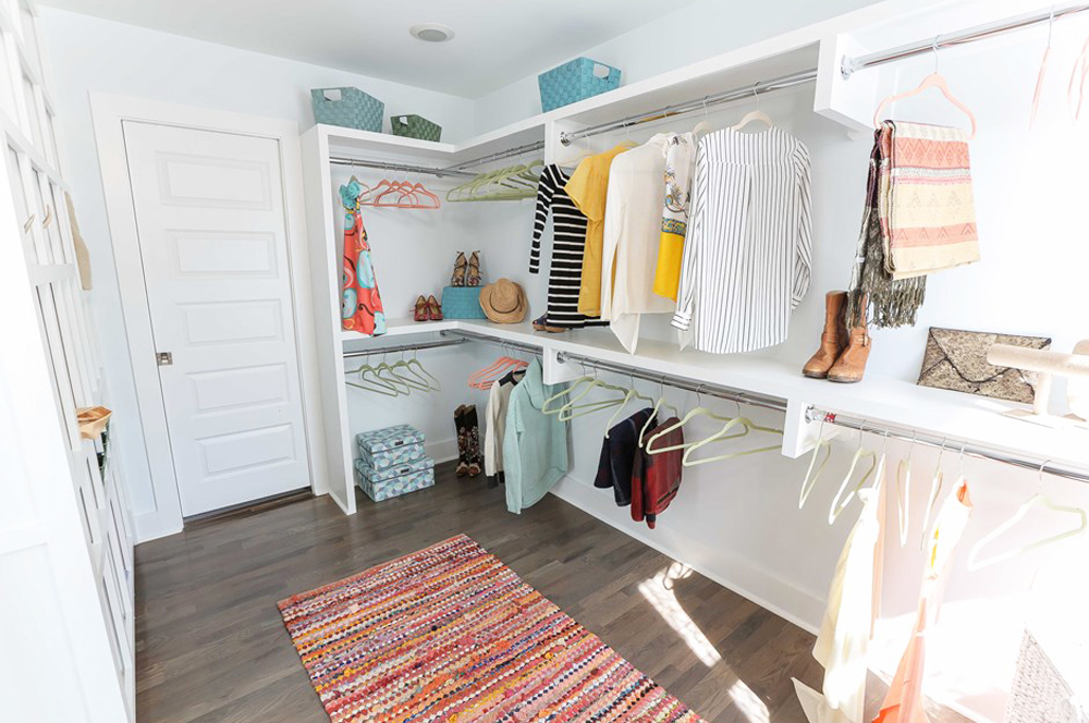 A large walk-in closet with plenty of storage space and natural light