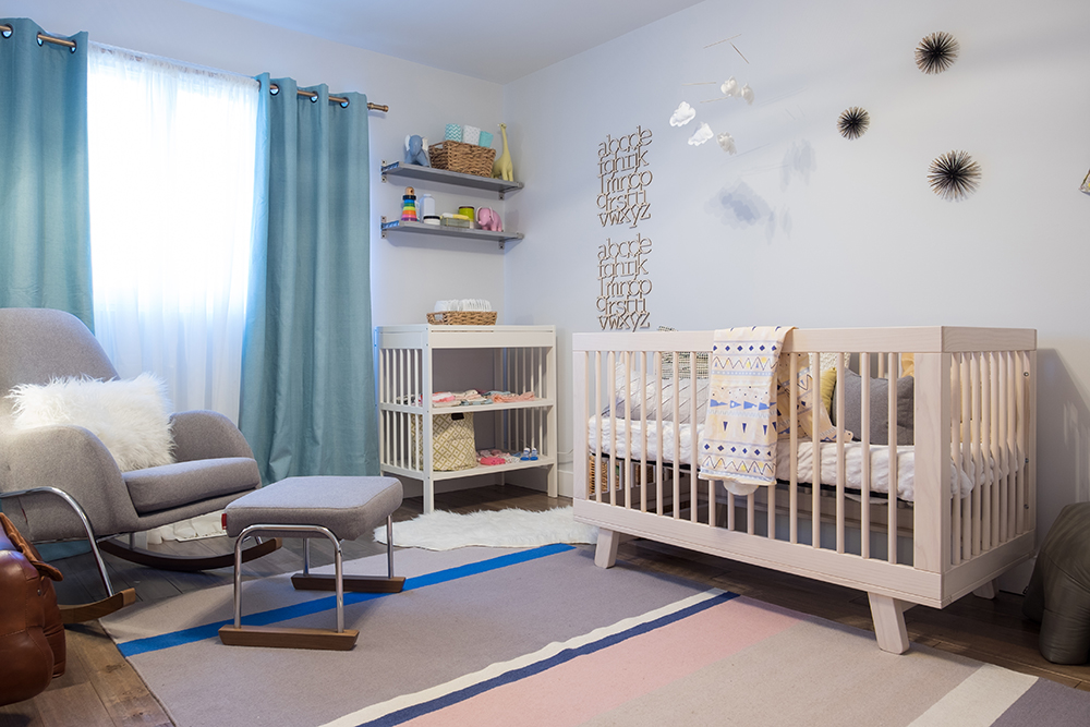 Stylish blue, grey and pink nursery room.