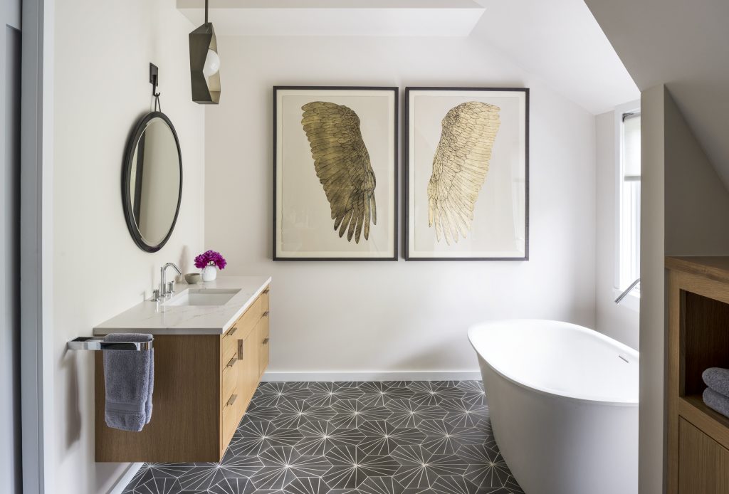 Floating vanity with graphic tile and artwork