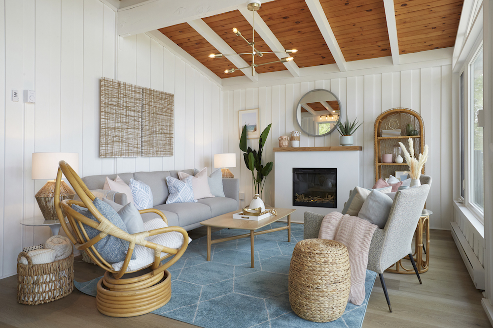 White coastal living room with grey and wood furniture