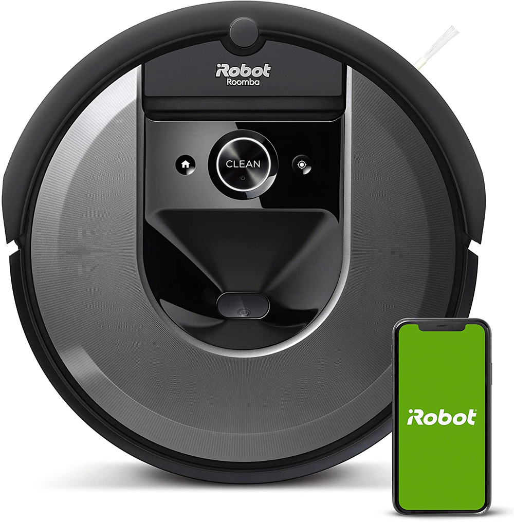 A black iRobot Roomba vacuum with Wifi pictured upright alongside a cell phone