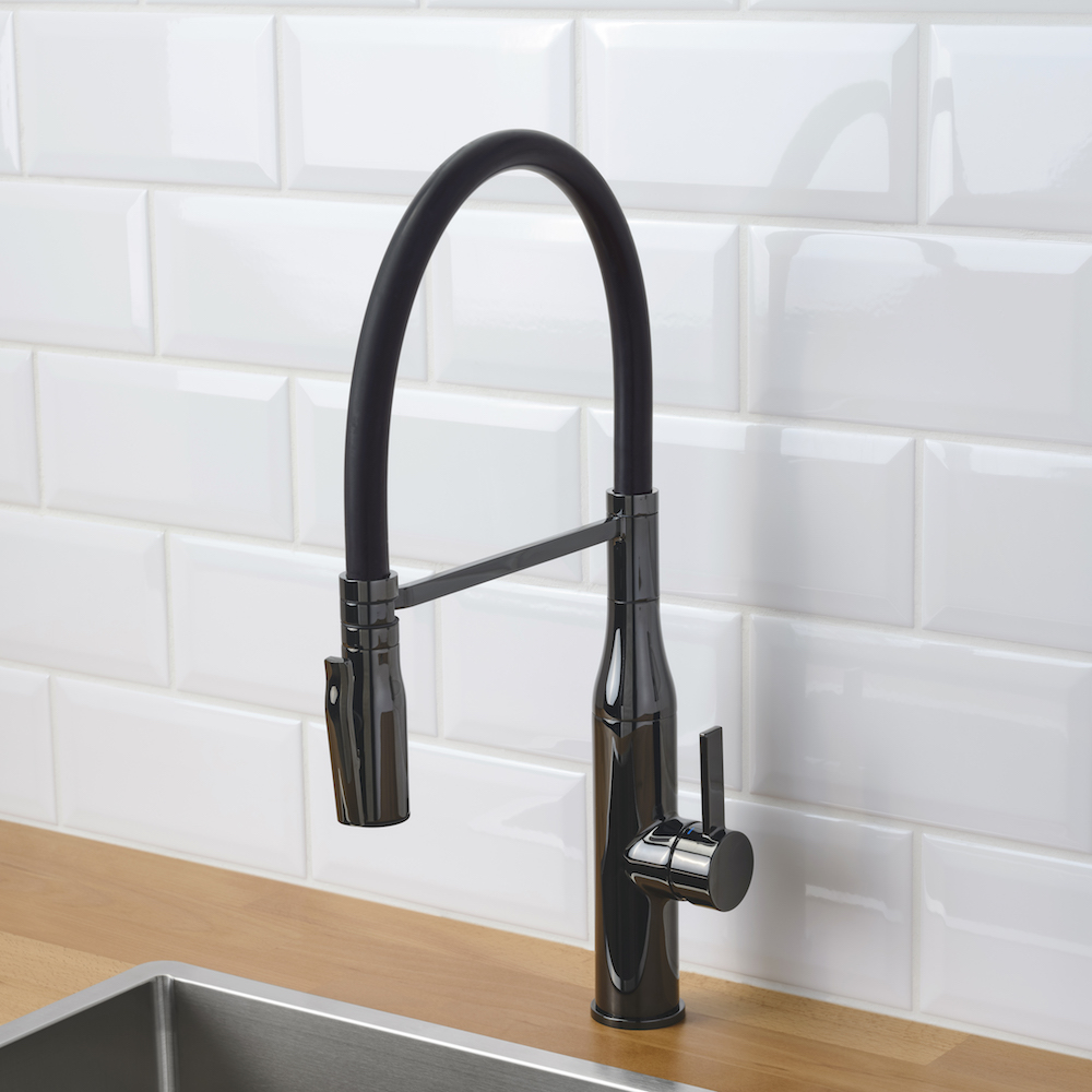 Black gooseneck kitchen faucet against subway tile backsplash