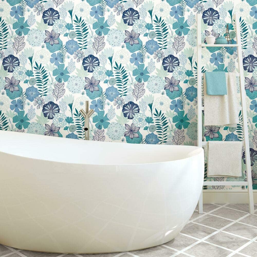 Pretty turquoise flowered wallpaper in bathroom