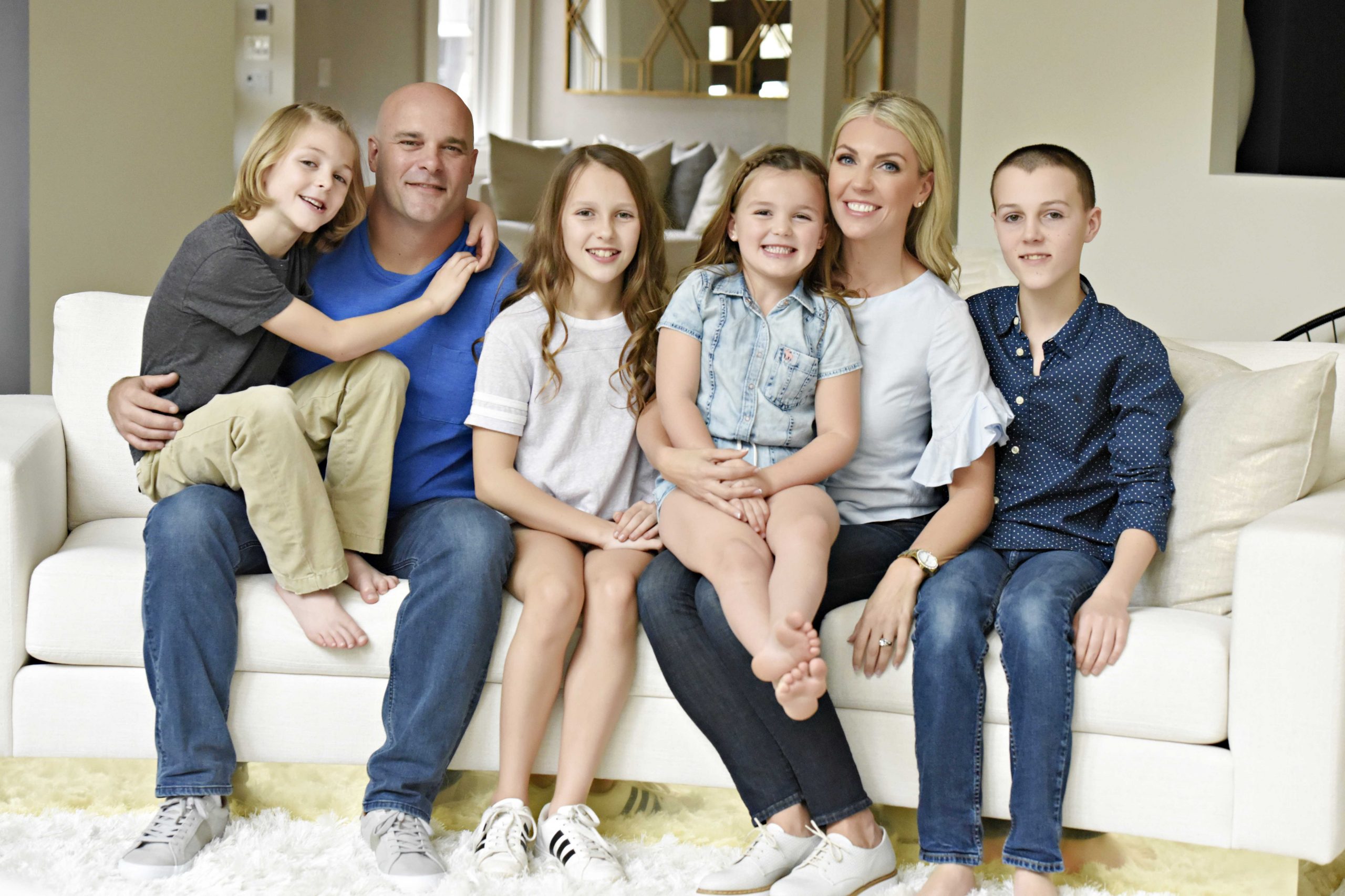 A perfect family photo of Bryan and Sarah Baeumler with their four kids; Lincoln, Charlotte, JoJo and Quintyn.