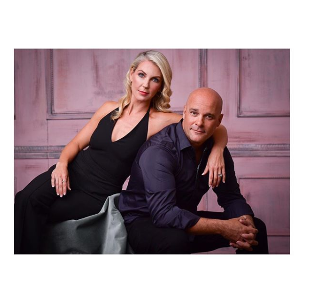 Bryan Baeumler and Sarah Baeumler dressed up for the 25th Anniversary of the Estee Lauder Breast Cancer Campaign.