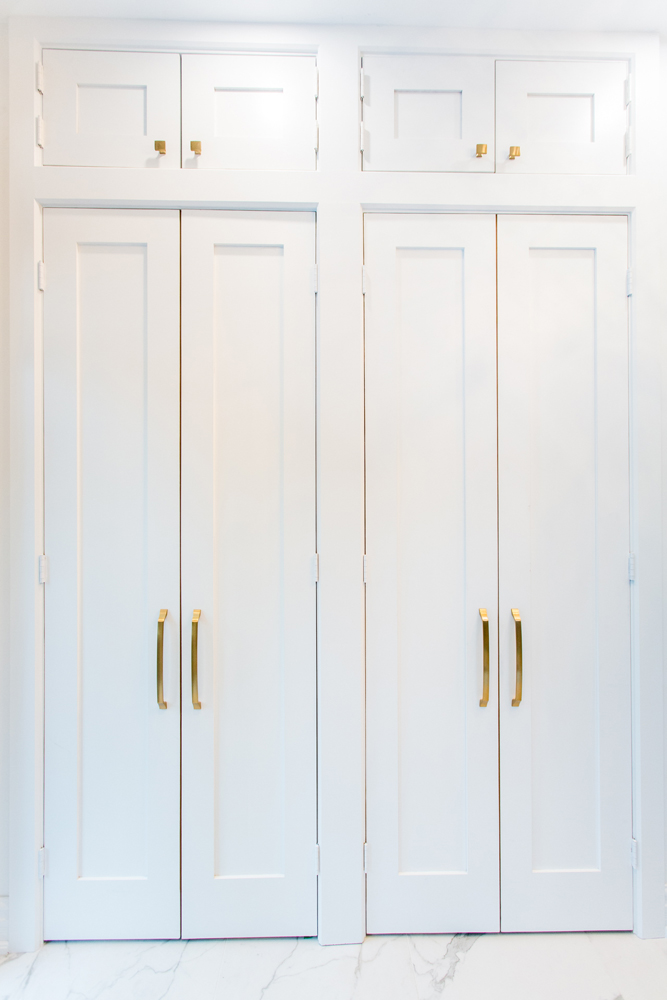Double-door built-in closets stand in the front entryway.
