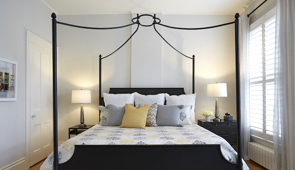A unique wrought iron canopy bed frame