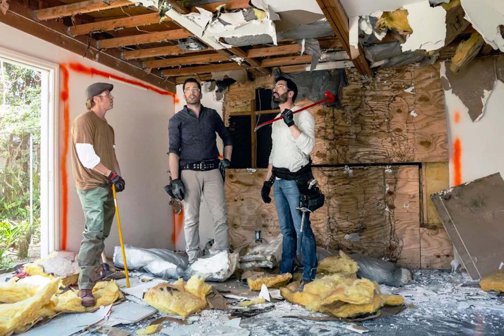Brad Pitt chats with the Property Brothers in the midst of tearing down the original guest house