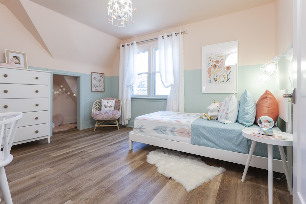 An updated girl's bedroom with two-tone paint