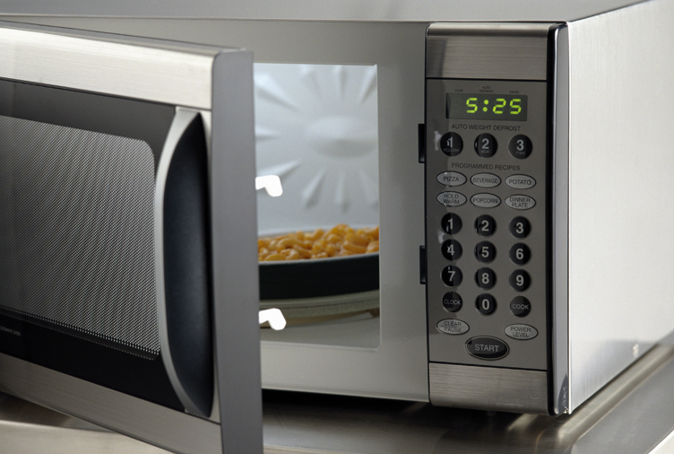 Microwave oven with macaroni and cheese