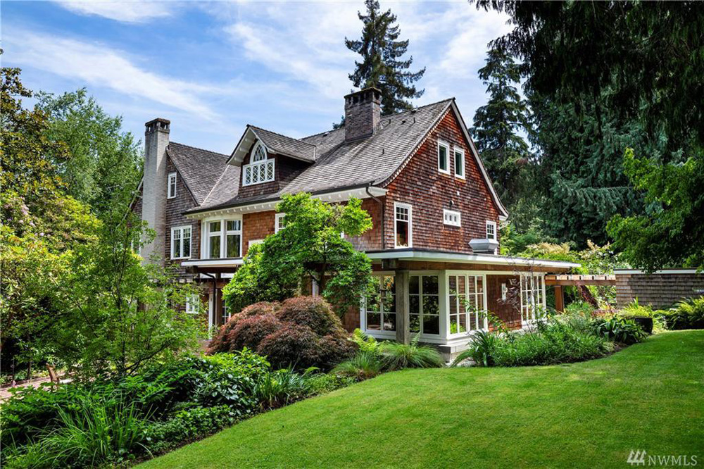 Exterior shot of a perfectly manicured front lawn and house once owned by Kurt Cobain and Courtney Love