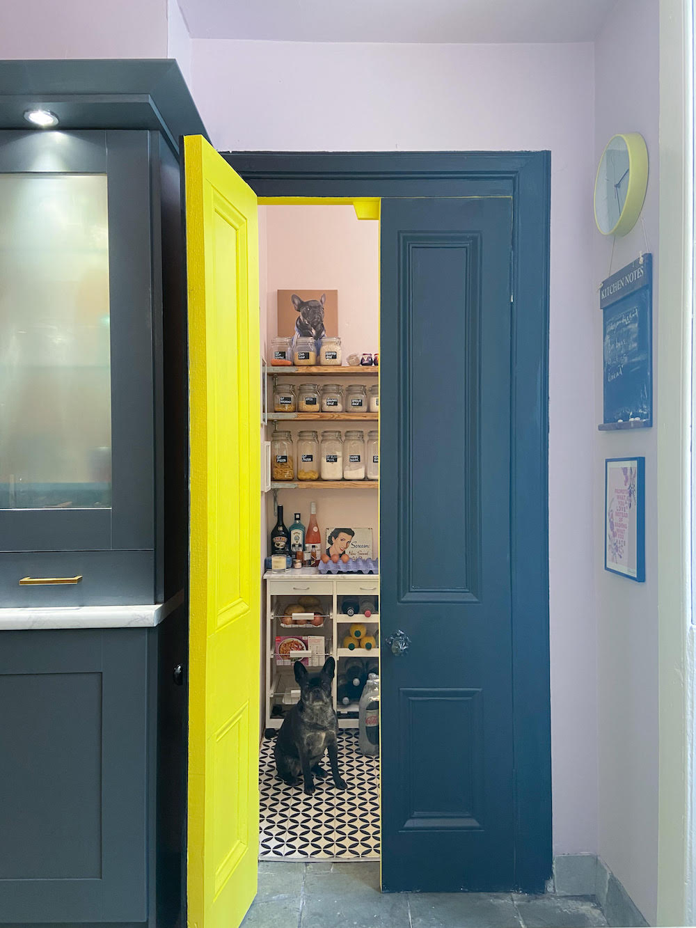 A pantry with a bright fluorescent interior door