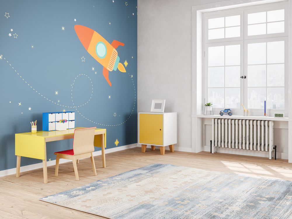 kids bedroom with rocket accent wall