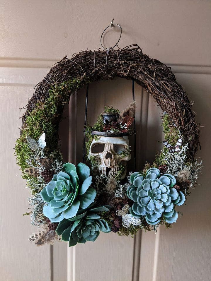 Halloween wreath with skull and paper butterflies