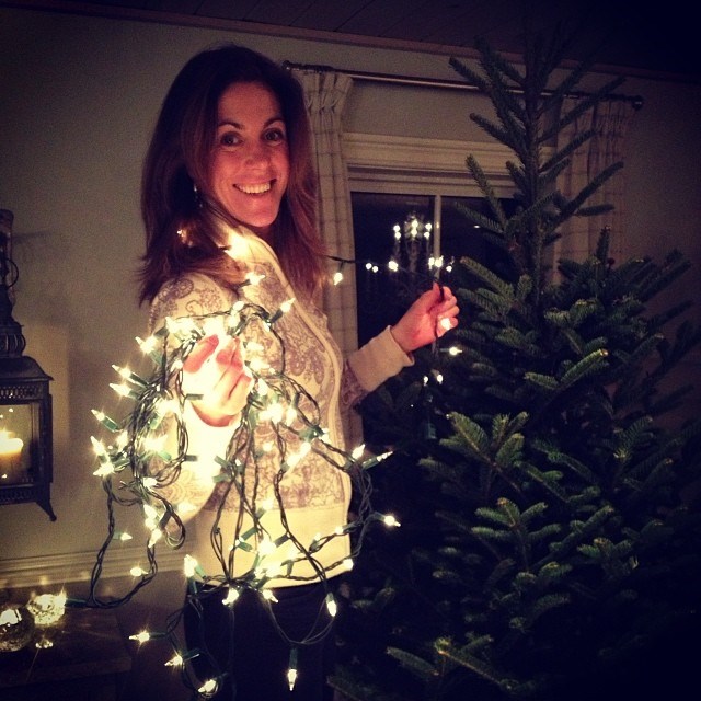 Sarah Richardson posed for a quick picture while decorating her Christmas tree with string lights last December.