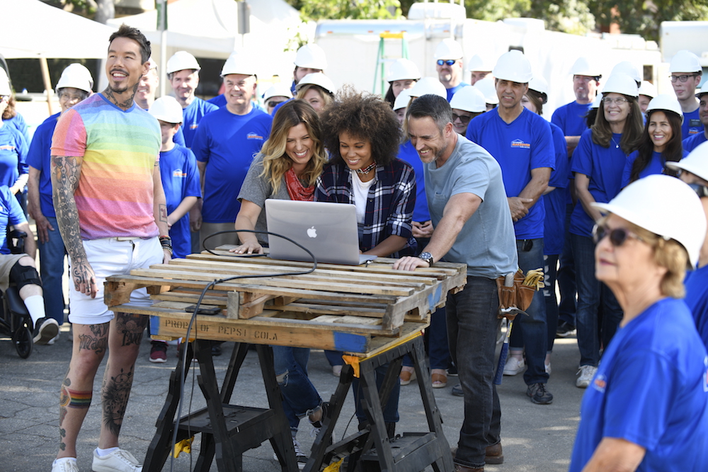 Volunteers and HGTV stars on set of Extreme Makeover: Home Edition